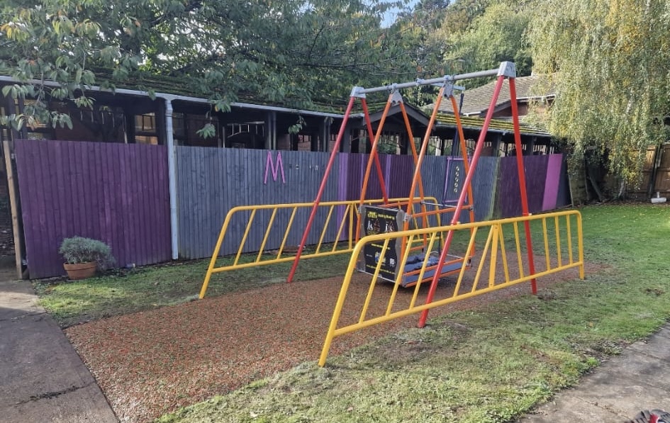 Disability swing with mulch surfacing